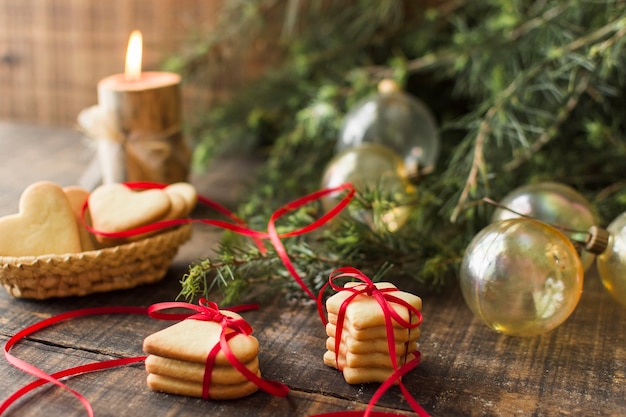 Free photo cookies with baubles on table