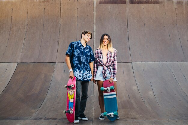 Cool friends posing with skates