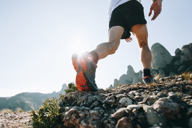 Cool man with tattoos ultra trail runner