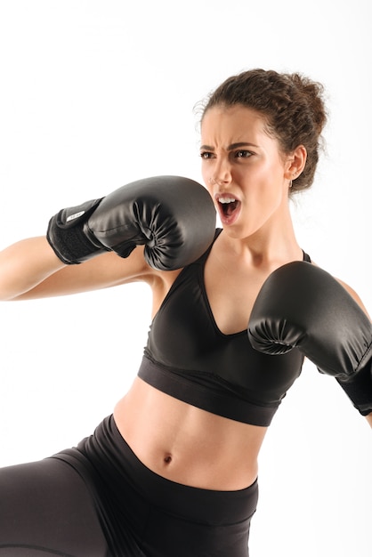 cool screaming curly brunette fitness woman