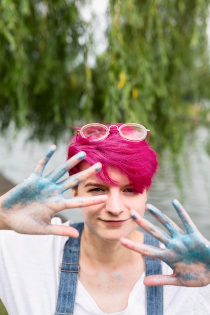 Free photo cool teen showing her palms