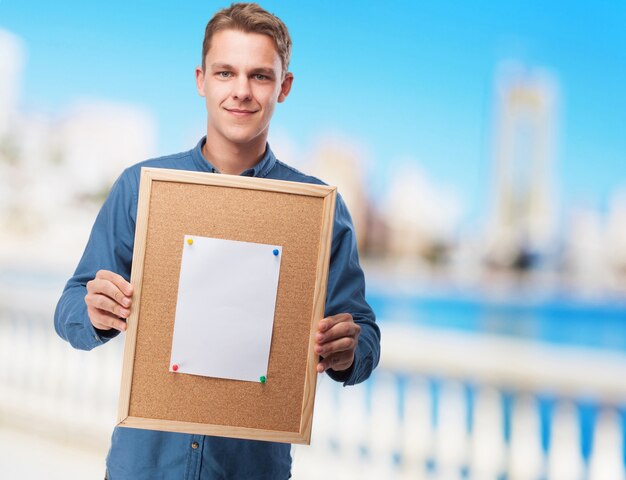 cool young-man with corkboard