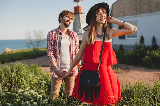 Cool young stylish couple in love in countryside