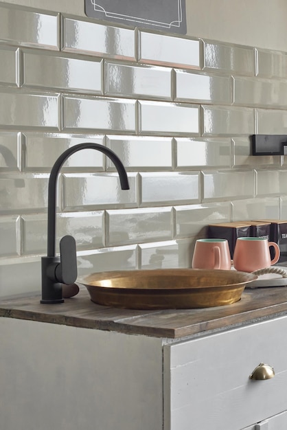 Copper sink on elegant kitchen counter at country house