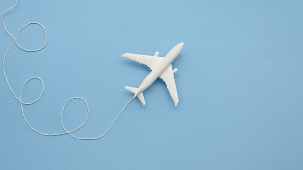 Free photo copy-space airplane toy on table