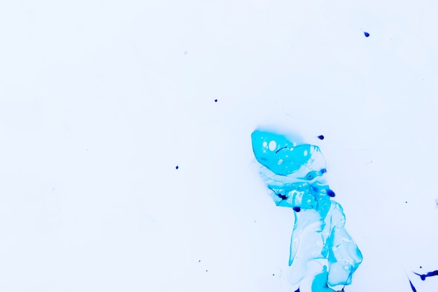 Free Photo copy space blue splash with ink drops