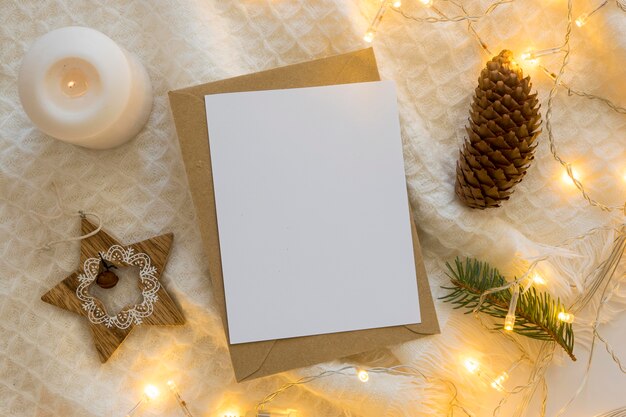 Copy space card with envelope and christmas lights