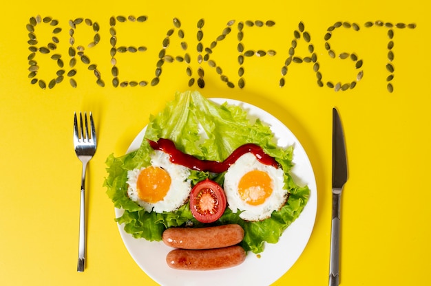 Free Photo copy space fried egg with fresh vegetables face arrangement on plain background