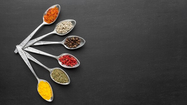 Copy-space spoons with powder condiments