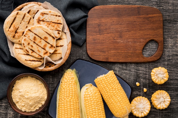 Corn and arepas arrangement flat lay