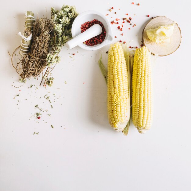 Corn ears and herbs