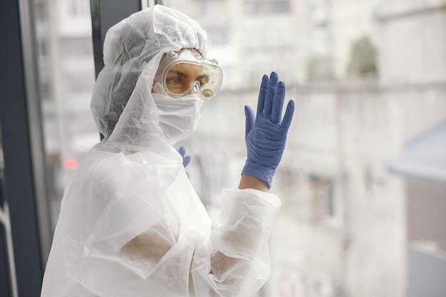 Free photo coronavirus pandemic covid-2019. protective suit, googles, gloves, mask.