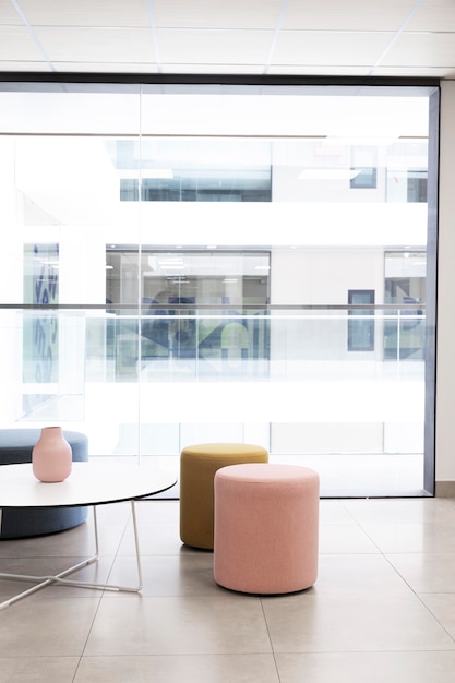 Free photo corporate building with empty room and chairs