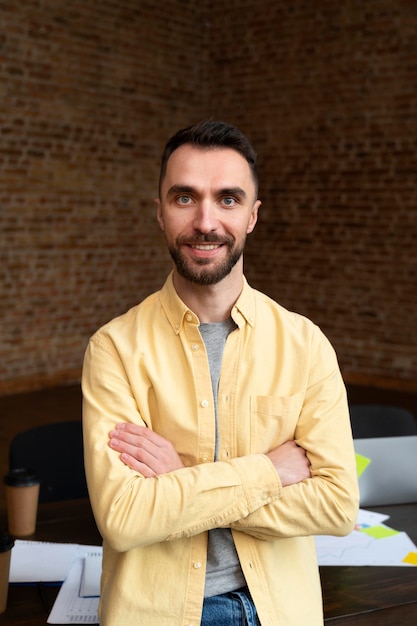 Corporate employee posing at the office