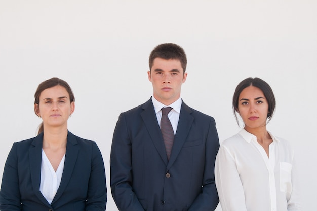 Corporate portrait of serious successful business team