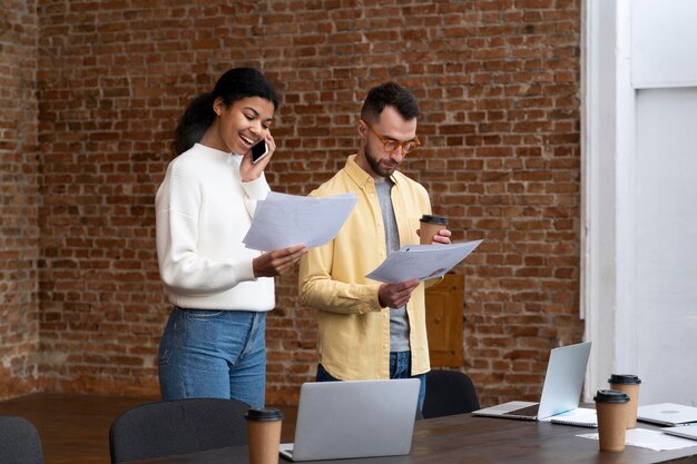 Corporate workers brainstorming together