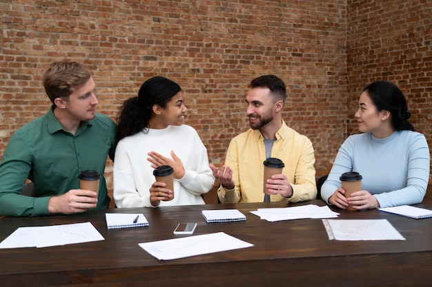 Free Photo corporate workers brainstorming together