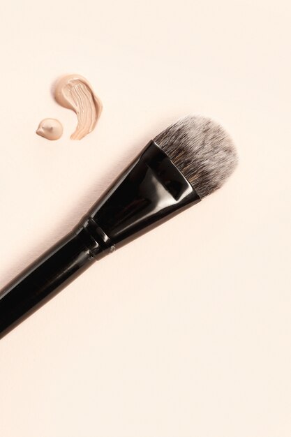 Cosmetic foundation cream and powder with brush