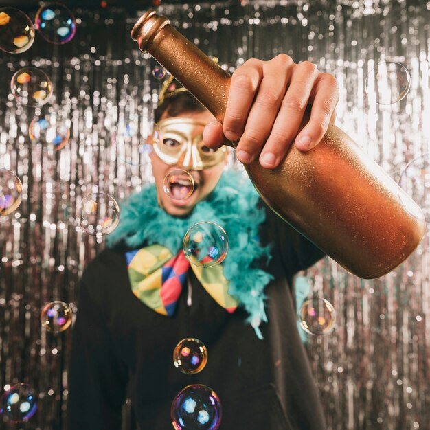 Costumed male with champagne bottle