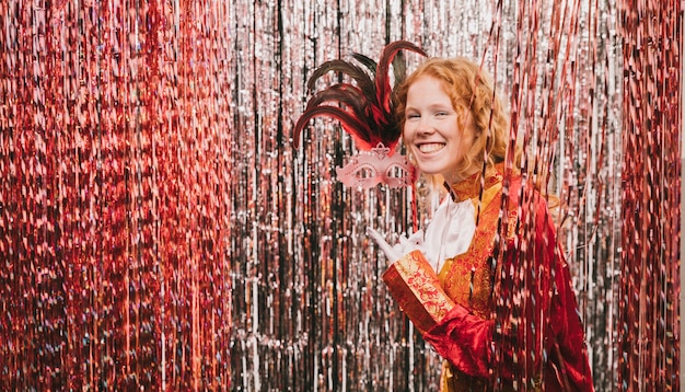 Free photo costumed smiley woman at party