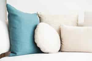 Free photo couch with cushions and one blue