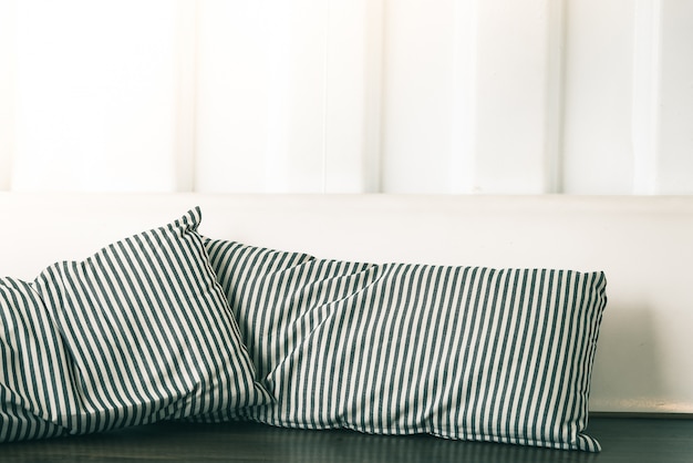 Free photo couch with striped cushions