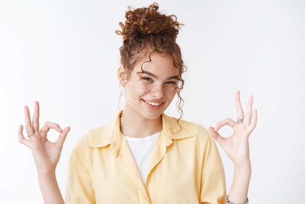 Free Photo count me in portrait confident energized goodlooking assertive charming redhead female friend give okay ok gesture assure everything perfect work done great pleased satisfied hundred percent