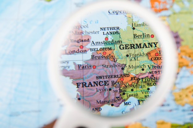 Countries and cities seen through magnifying glass