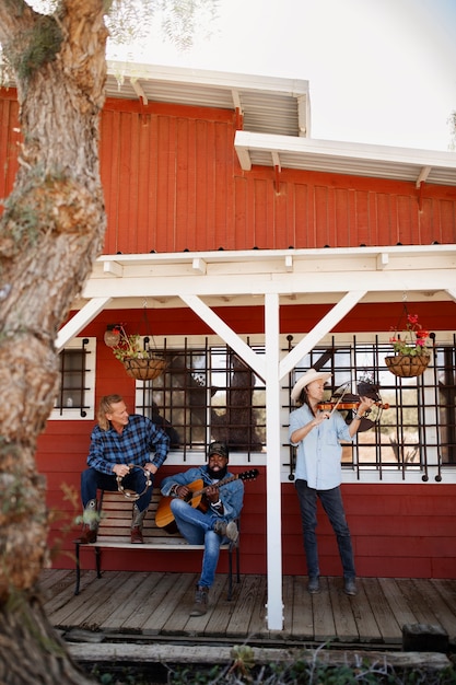 Country music band singing outdoors