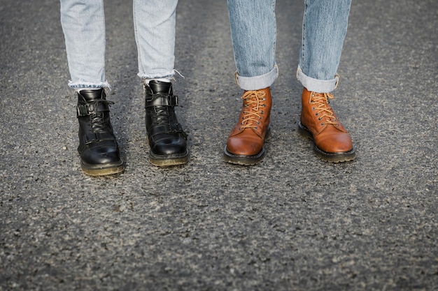 Couple in boots on a road trip together