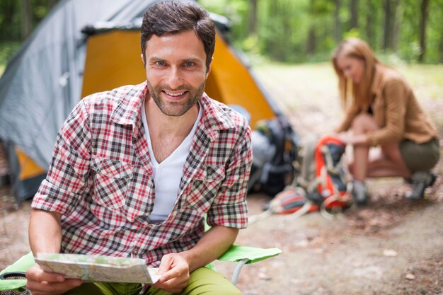 Couple camping in the forest