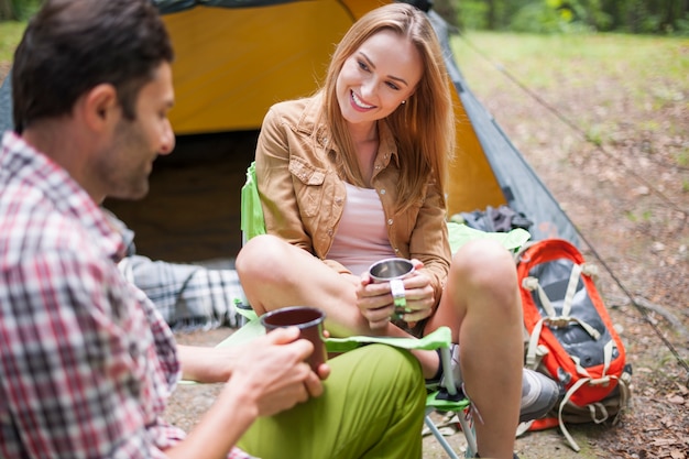 Couple camping in the forest