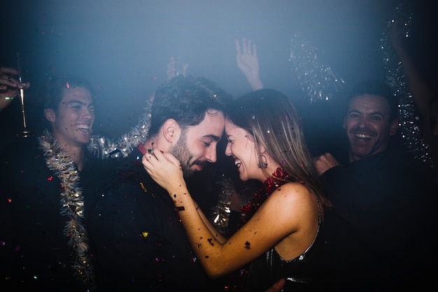 Free Photo couple celebrating and dancing in club