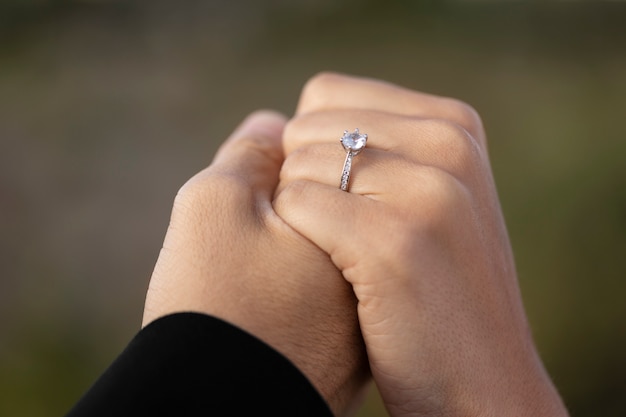 Free photo couple celebrating engagement together