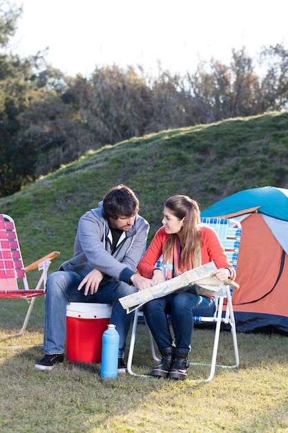 Couple checking the route on the map