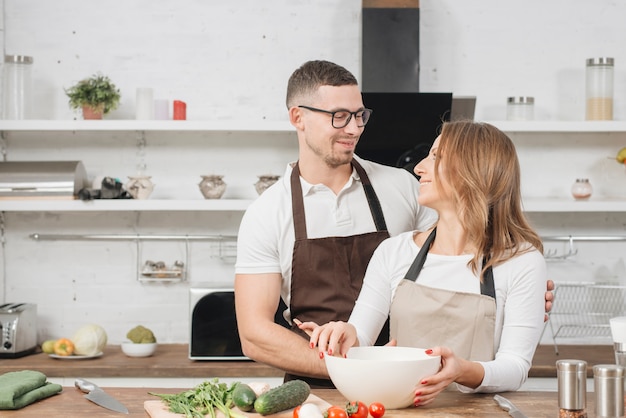 Couple cooking at home