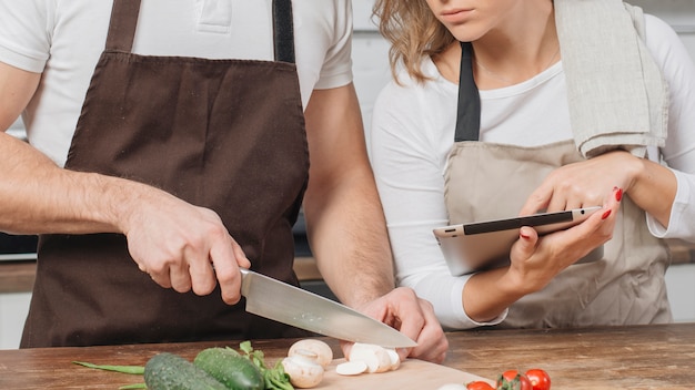 Couple cooking at home