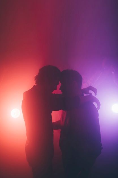 Free Photo couple dancing in nightclub