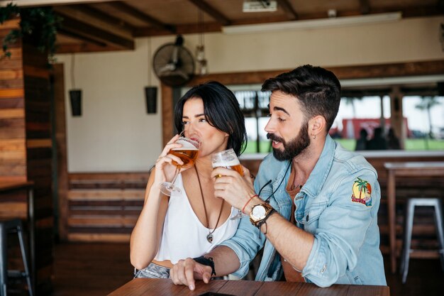 Couple drinking beer