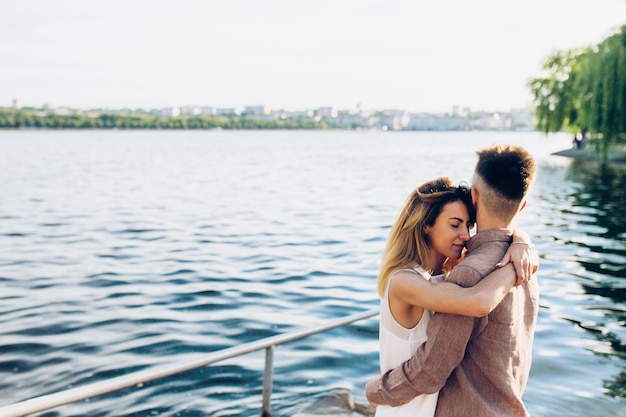 Couple embracing on quay