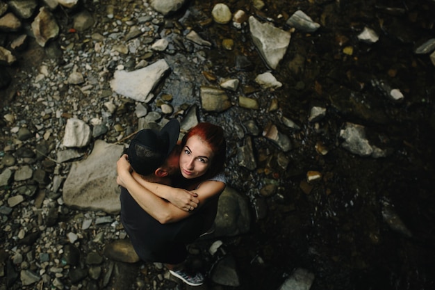 Free Photo couple embracing view from above