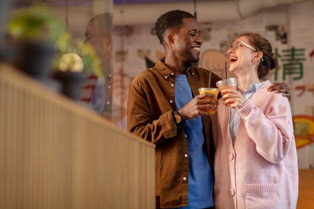 Couple enjoying drinks in restaurant