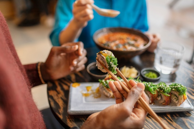 Couple enjoying food in restaurant