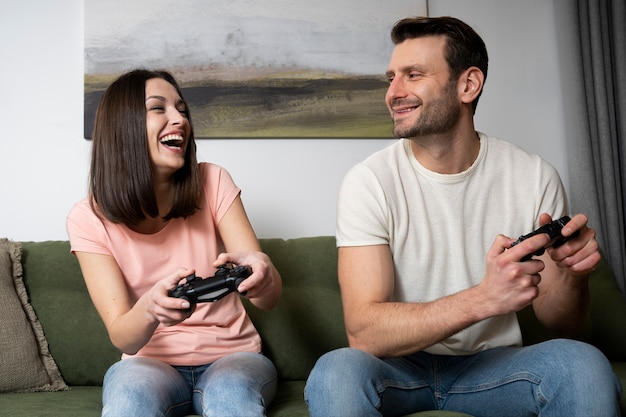 Couple enjoying playing video game