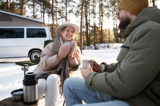 Couple enjoying their winter camp