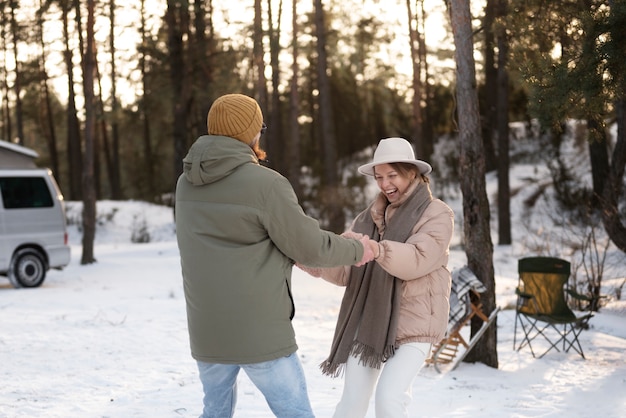 Couple enjoying their winter camp