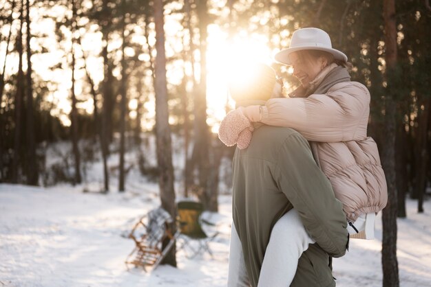 Couple enjoying their winter camp