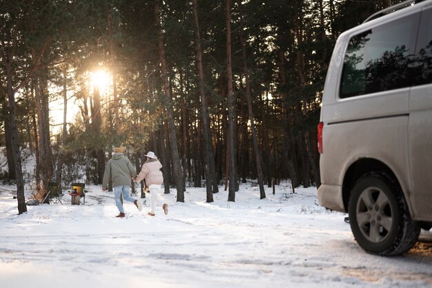 Couple enjoying their winter camp