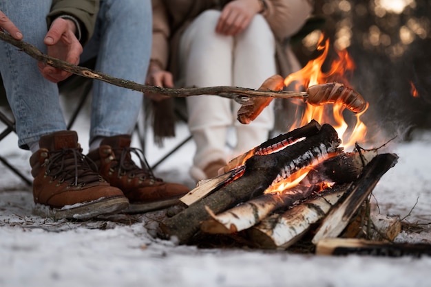 Couple enjoying their winter camp