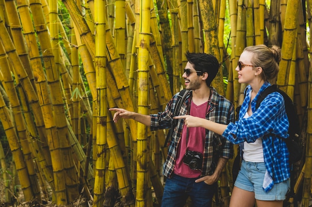 Couple exploring bamboo forest